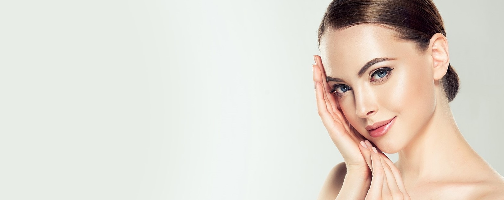 Woman caressing her face